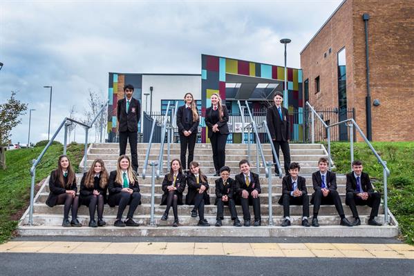 pupils on school steps