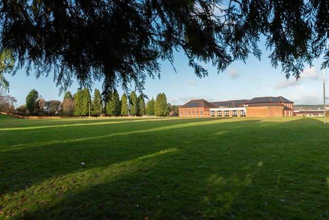 School_back_view_with_field.jpg