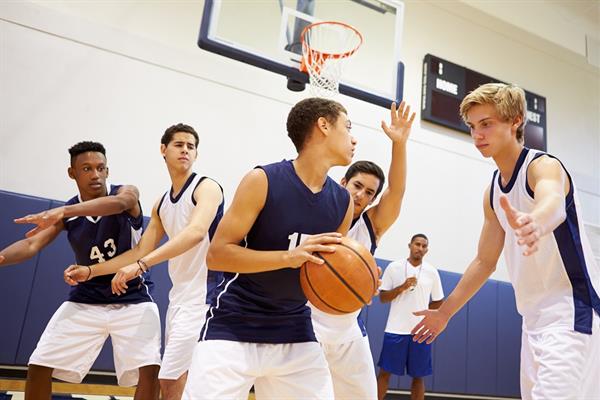 Group_of_male_teens_playing_basketball_-_resized.jpg