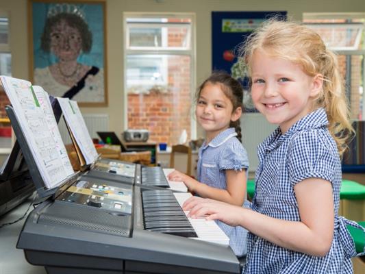 Classroom_Children_Play_Keyboard.jpg