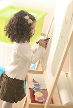 girldrawingonboarddaynurserieslarge_1.jpg